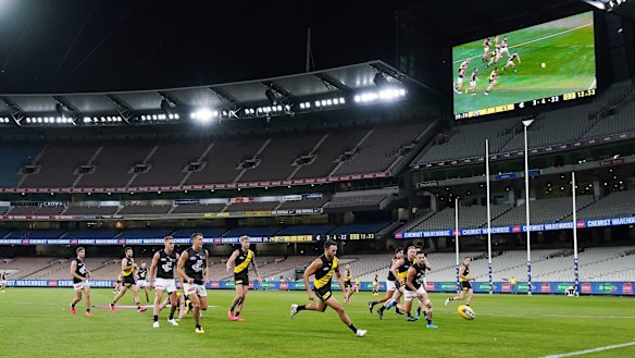 The sound and the fury: Richmond and Carlton in action at an empty MCG.