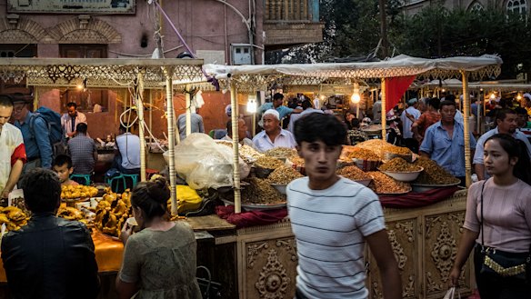 A market in Kashgar, a city in the Xinjiang region of China. Uighurs are under constant surveillance wherever they go in Xinjiang. 