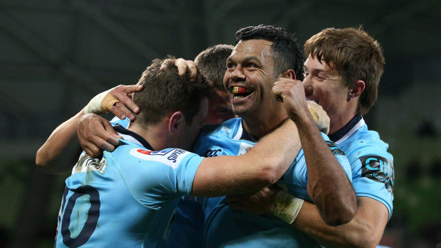 Pumped: Kurtley Beale celebrates a Waratahs win over the Rebels last year in Melbourne. 