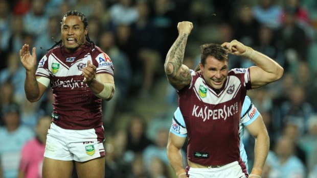 Anthony Watmough celebrates scoring a try for Manly in 2013.