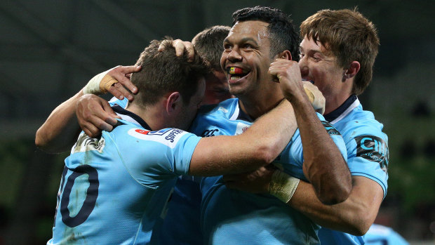 Comeback kings: Kurtley Beale shows his delight after NSW scored two late tries to beat the Rebels.