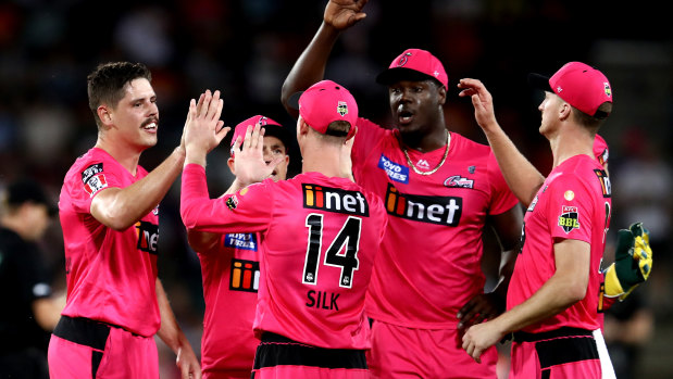 Sixers players celebrate