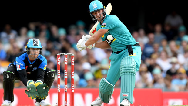 AB de Villiers of the Heat shapes up to hit a four against the Adelaide Strikers at the Gabba on Tuesday.
