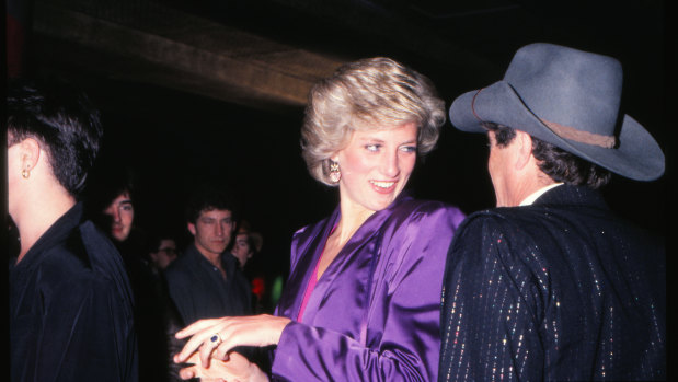 Princess Diana and Molly Meldrum attend a charity rock concert at the Melbourne Concert Hall.