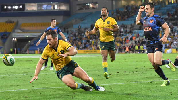 Blown it: Bernard Foley dives for the ball in vain after Israel Folau failed to pass to him in the open for what would have been the match-winning try.
