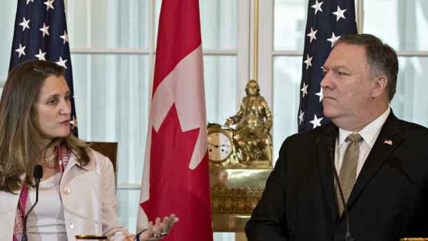 Chrystia Freeland, Canada's minister of foreign affairs, speaks as Mike Pompeo, US secretary of state, right, listens.