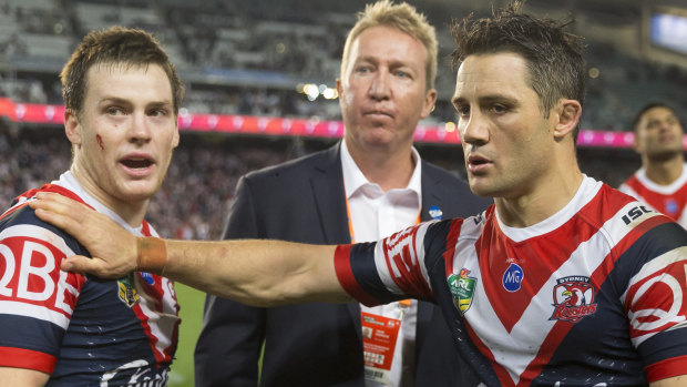 Passing the mantle: Cooper Cronk pats Keary on the shoulder after their semi-final victory. 