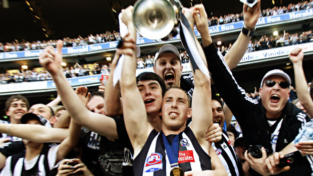 Nick Maxwell holds aloft the 2010 premiership cup.