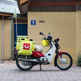 The postie’s trusty 100cc steed.