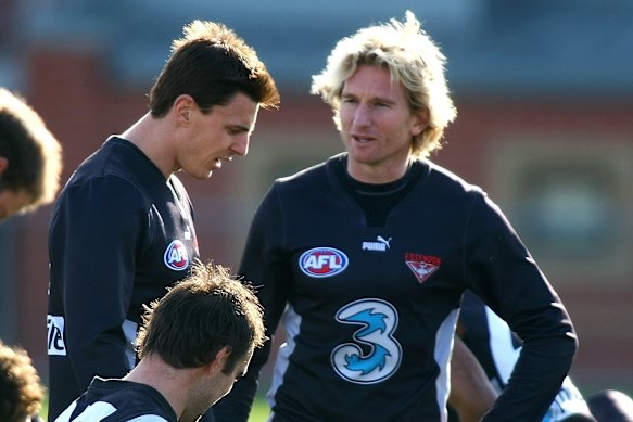 Matthew Lloyd and James Hird in their days as teammates at the Bombers.