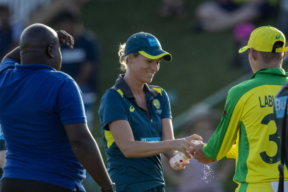 Marnus Labuschagne uses hand sanitiser during the third ODI against South Africa earlier this year.