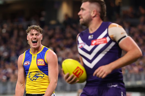 Eagles' Harley Reid reacts after awarding a free kick to Dockers' Luke Ryan.