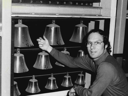 Ron Sharp tunes the bells of the organ at the Opera House.