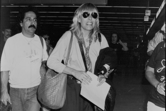 “Joni Mitchell the singer-songwriter of Big Yellow Taxi fame, flew into Sydney today for her first Australian concert tour. She was accompanied by her husband Larry Klein, 25, who plays in her backing band.” March 9, 1983.