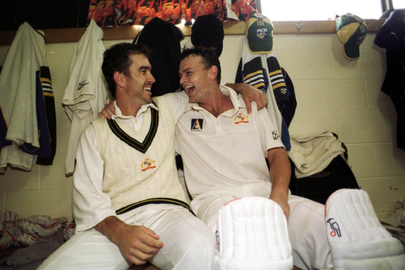 Justin Langer and Adam Gilchrist celebrate a Test win against Pakistan in 1999.