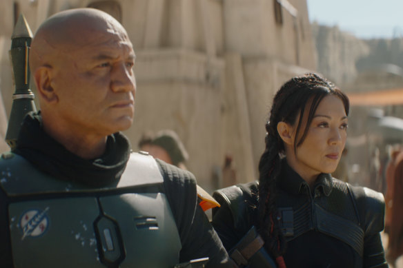 Boba Fett (Temuera Morrison) and Fennec Shand (Ming-Na Wen) on the mean streets of Tatooine.