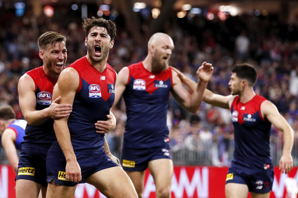 A Christian Petracca-inspired Melbourne stormed to victory over the Dogs.
