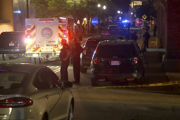 Police and emergency personnel respond the scene of the explosion in Boston.