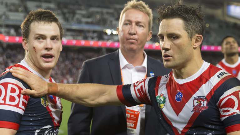 Passing the mantle: Cooper Cronk pats Keary on the shoulder after their semi-final victory. 