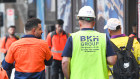 Construction workers attending Lendlease’s One Circular Quay tower on Monday morning.