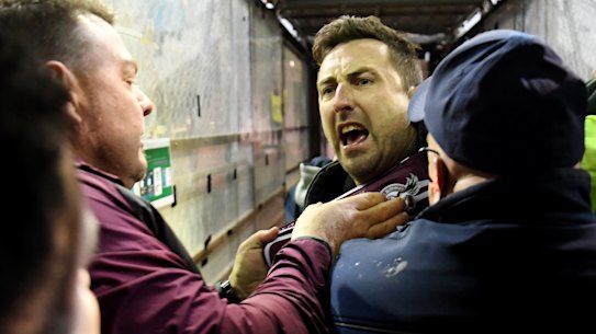 Security and police swooped on a Manly fan  who confronted Melbourne Storm’s Will Chambers.