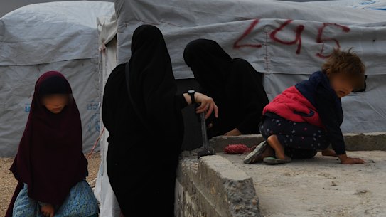 Women and children in the foreign annex of a camp in Syria in 2019.