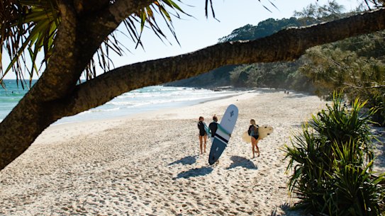 Locals surfing at Byron Bay.