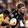 Brendan Piakura looks to offload for the Broncos.