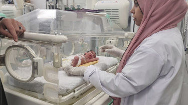 Palestinian baby girl, Sabreen Jouda, who was delivered prematurely after her mother was killed in an Israeli strike, receives treatment in the Emirati hospital in Rafah, southern Gaza Strip, last Sunday.
