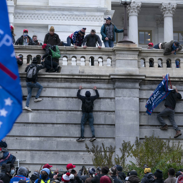 Trump supporters storm the US Capitol building in Washington, DC on January 6.