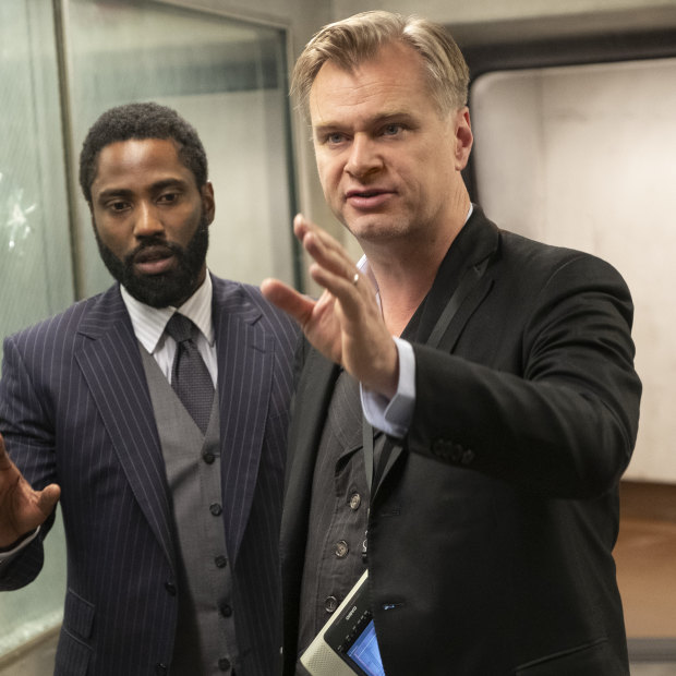 Christopher Nolan, right, directs John David Washington on the set of Tenet.