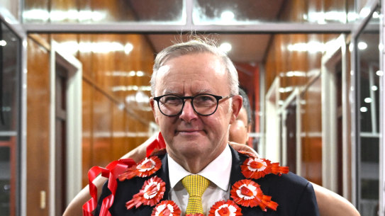 Anthony Albanese receiving a lei on arrival at the PIF in Tonga.