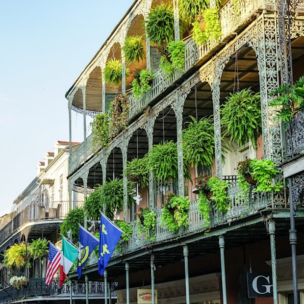 Iron lace balconies on traditional buildings in New Orleans’ French Quarter.