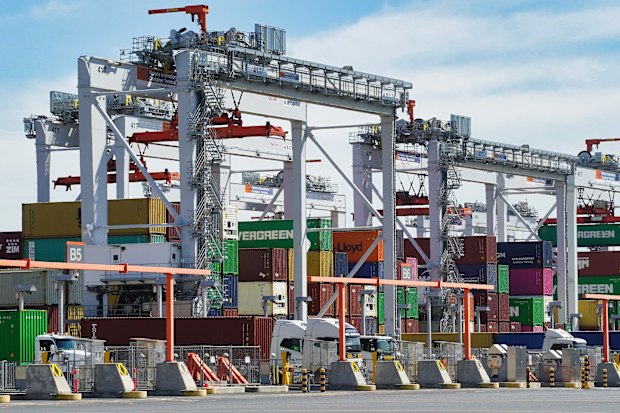 Automated landside cranes manage containers for trucks at Webb Dock.