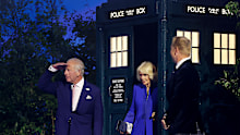 King Charles III and Queen Camilla walk out of the TARDIS during the opening ceremony ahead of the Glasgow 2026 Commonwealth Games at The Hydro on July 23, 2026 in Glasgow, Scotland.