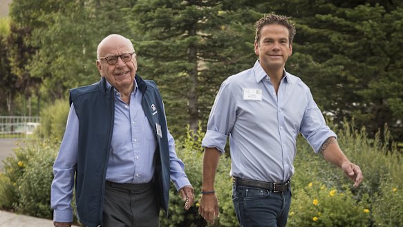 Power player: Lachlan Murdoch with father Rupert.