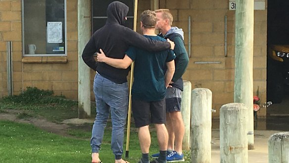Mourners outside the Port Campbell Surf Life Saving Club.