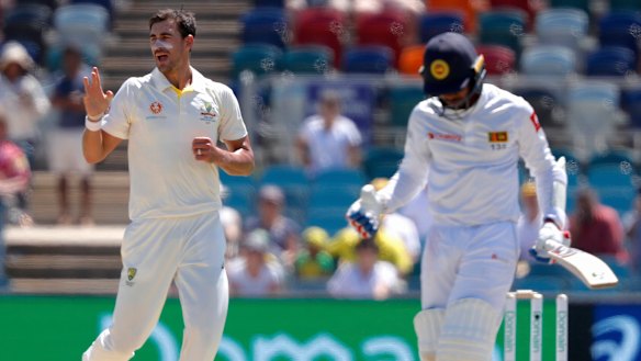 Balm for his wounds: Mitchell Starc dismisses Dhananjaya de Silva. 