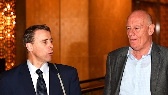 Stephen Mayne and Tim Costello leaving  Crown’s annual general meeting.