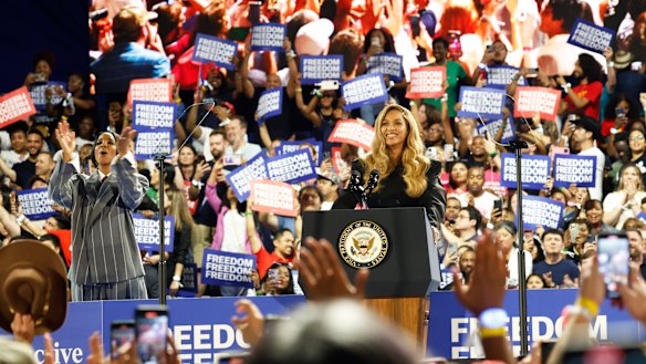 Beyoncé on the stage in Houston with fellow former Destiny’s Child member Kelly Rowland (left).
