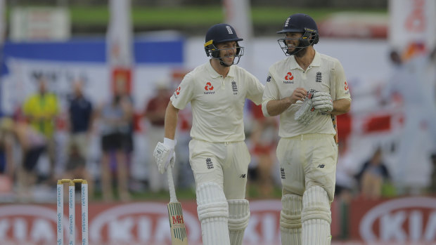 Making a stand: Ben Foakes, right, and Jack Leach leave the field at stumps.