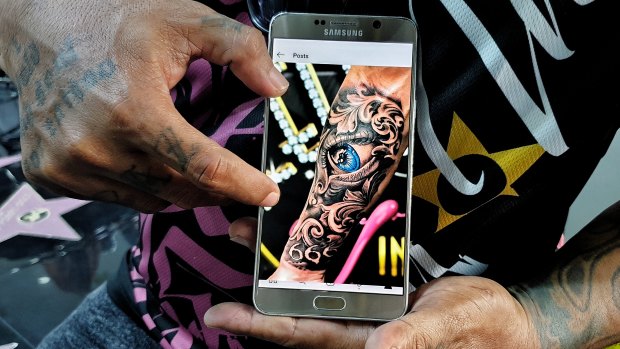 Gede Supala, aka Shotonk, a well known senior tattoo artist showing off one of his best works. He is part of the tattoo artist crew at Celebrity Ink Tattoo Bali studio. 