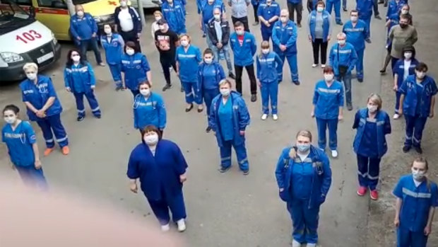 Medical workers record a video appeal to Russian President Vladimir Putin in Armavir, Russia.