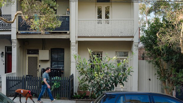 The tiny terrace hides an “experimental” polycarbonate addition with a soaring ceiling at the rear.