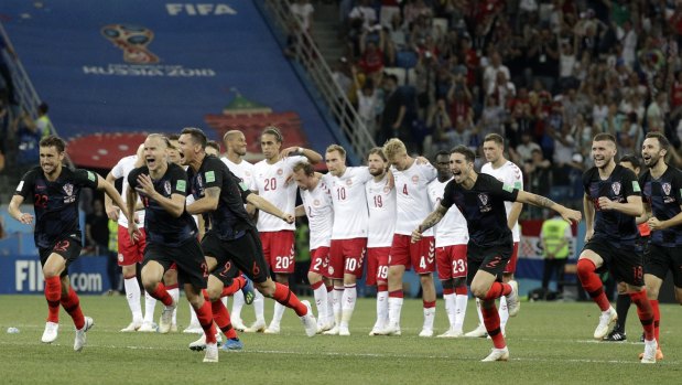 Just did enough: Croatian players celebrate after the final penalty.