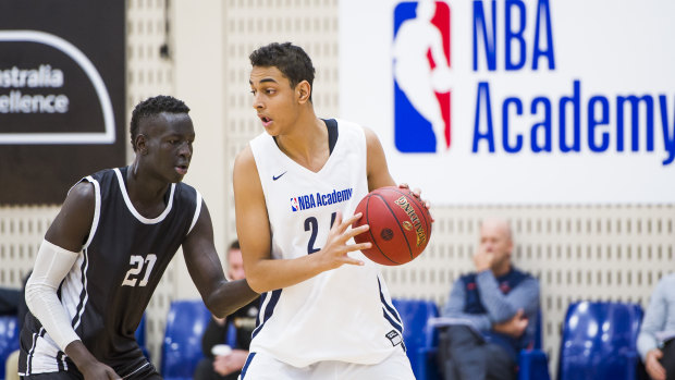 Egyptian Aly Khalifa (right) earned a scholarship to the NBA Global Academy in Canberra. 