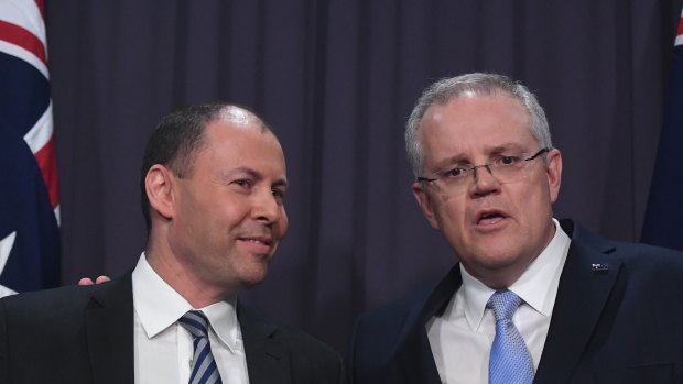 Newly elected leader of the Liberal Party Scott Morrison with deputy leader Josh Frydenberg speak to the media at Parliament House on Friday afternoon. 