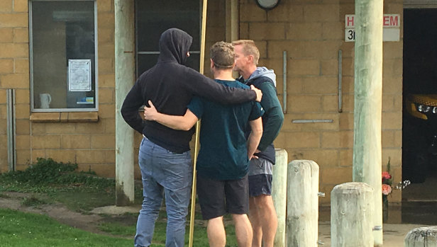 Mourners outside the Port Campbell Surf Life Saving Club.