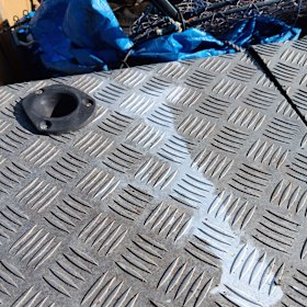 A mark the crocodile left on the fisherman’s tinnie.