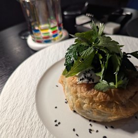 The Greek classic spanakopita features spinach and an airy fetta mousse encased in housemade filo pastry.